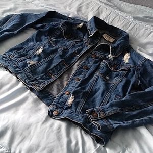 Distressed denim jacket